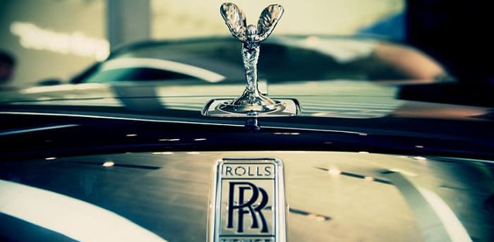 Thiết Kế Logo Rolls Royce: Ý Nghĩa Biểu Tượng, Màu Sắc - Rubee